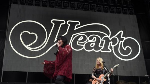 Ann Wilson, left, and Nancy Wilson of the band Heart performs at RFK Stadium on Saturday, July 4, 2015, in Washington. (Photo by Nick Wass/Invision/AP)
